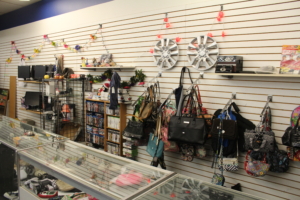 The specialty section includes purses, games and more.
