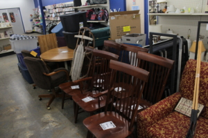 Furniture on display includes chairs and tables.